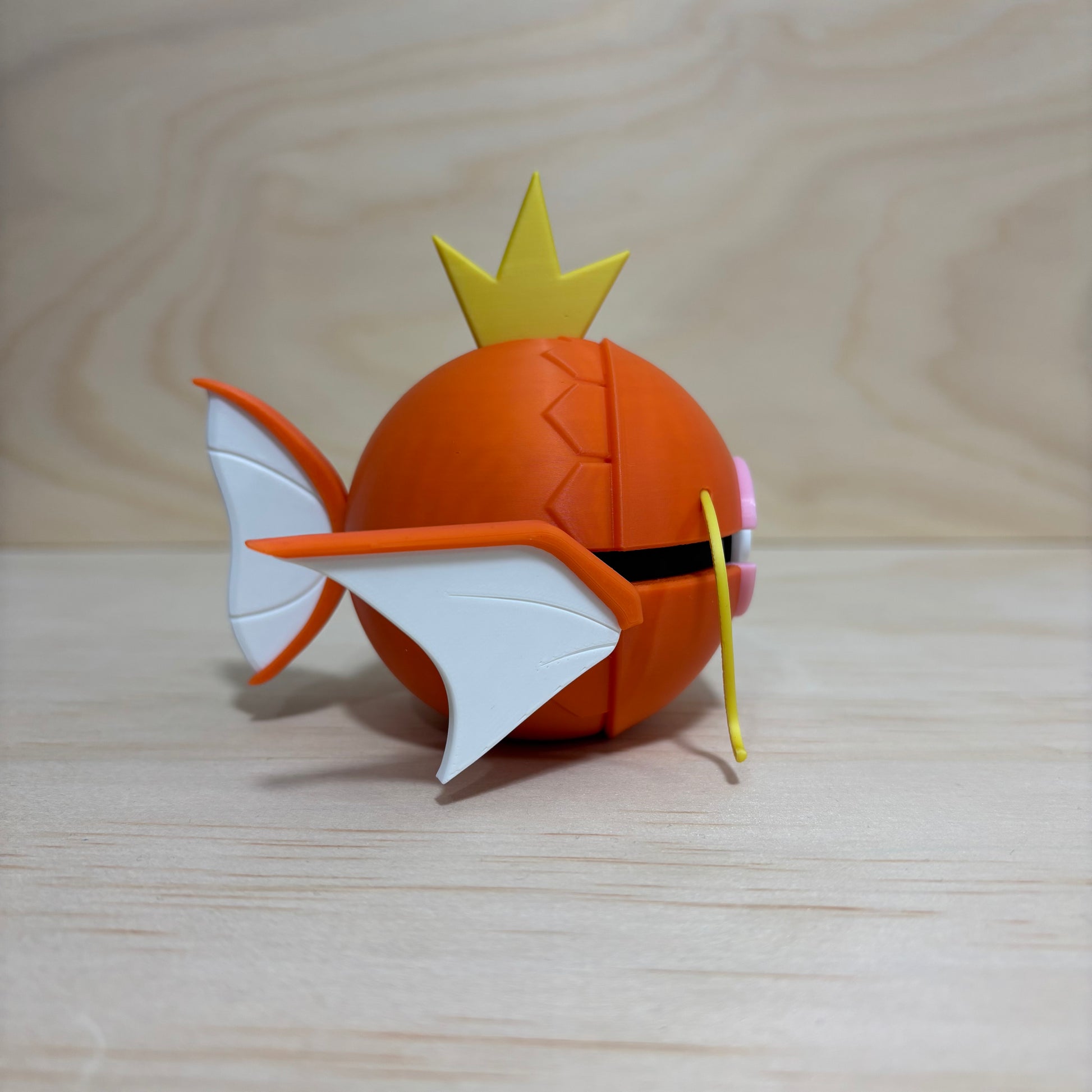 3D printed #0129 Magikarp Poké Ball collectible featuring Magikarp integrated into a Poké Ball-inspired design.