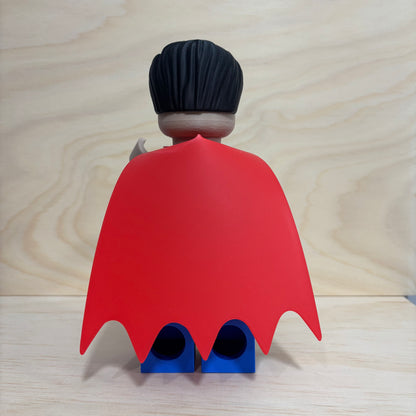 3D printed Superman Brickman Figure wearing the classic blue suit and red cape.