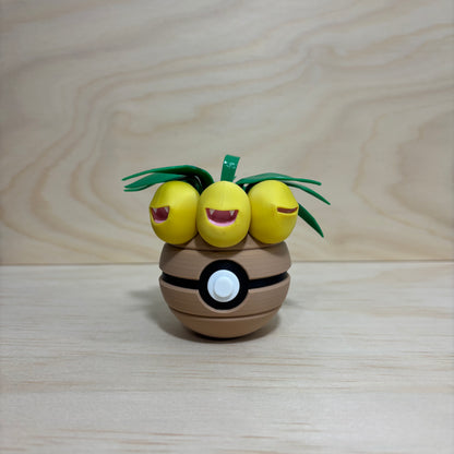 3D printed #0103 Exeggutor Poké Ball collectible featuring Exeggutor hidden inside an opening Poké Ball.