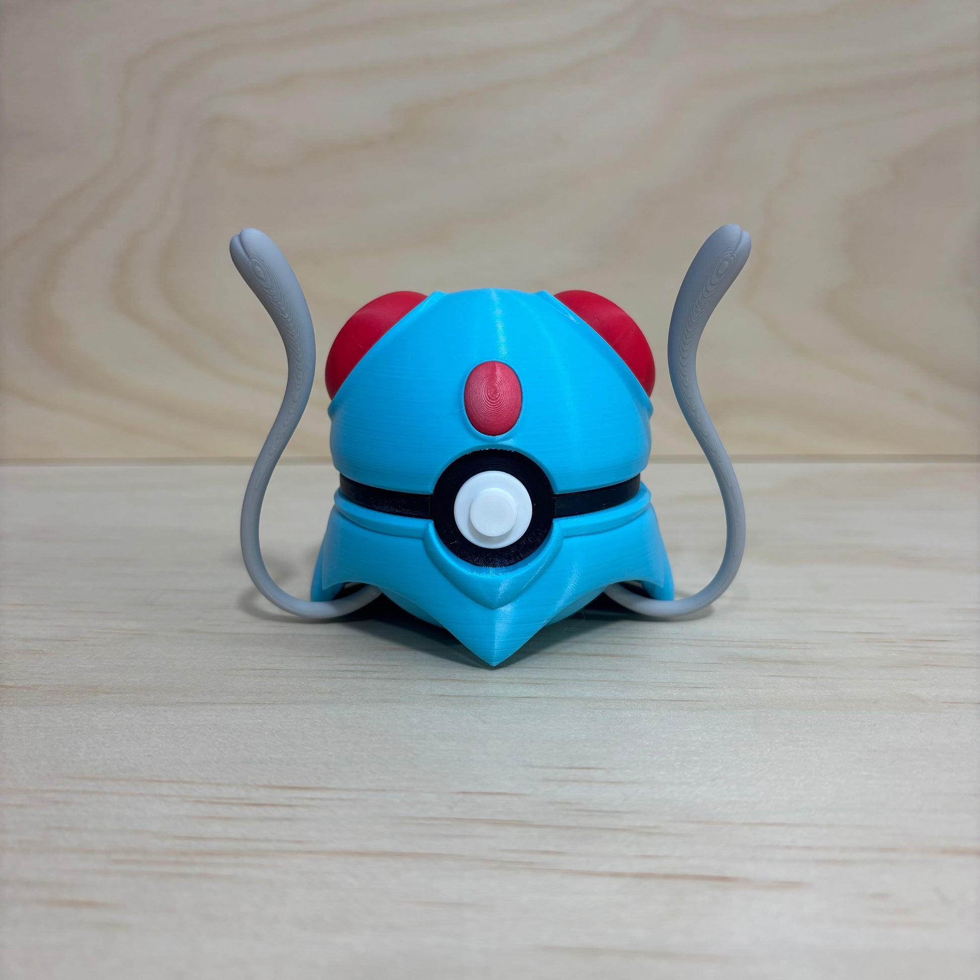 3D printed 0072 Tentacool Poké Ball collectible featuring Tentacool with flowing tentacles and signature red orbs.