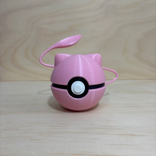 3D printed 0151 Mew Poké Ball collectible featuring Mew's ears and tail.