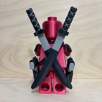 3D printed Deadpool Brickman Figure with removable katanas and dual pistols.