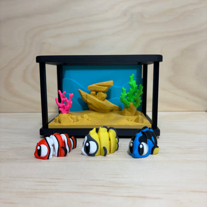 3D printed Mini Pal Aquarium Adventure play set featuring a miniature aquarium with coral, a shipwreck and three colourful flexi fish.