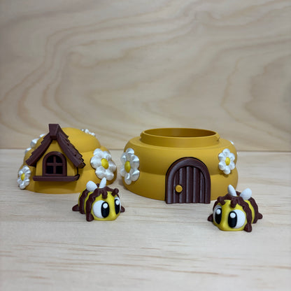 3D printed Mini Pal Bees & Beehive play set featuring two adorable flexi bees beside a flower-covered beehive.