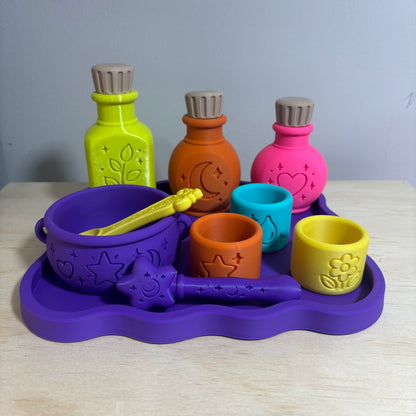 Colourful 3D printed Potion Play Set with potion bottles, mixing bowl, spoon, ingredient cups and purple tray